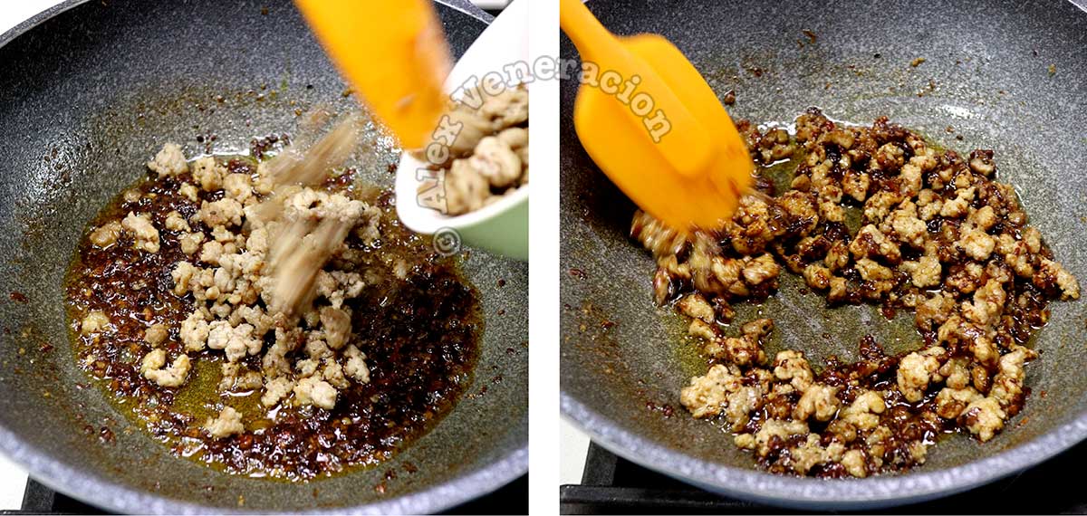 Adding browned ground pork to spices in wok