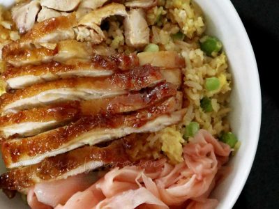 Chicken teriyaki served over rice with pickled ginger