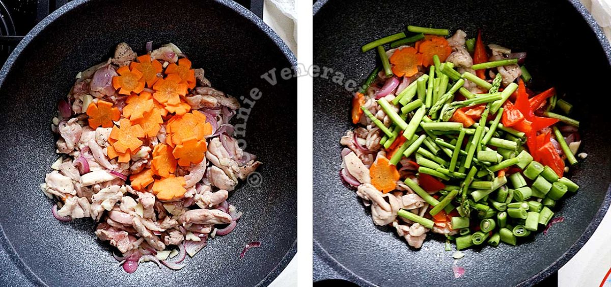 Stir frying chicken, carrot, asparagus, green beans and bell pepper
