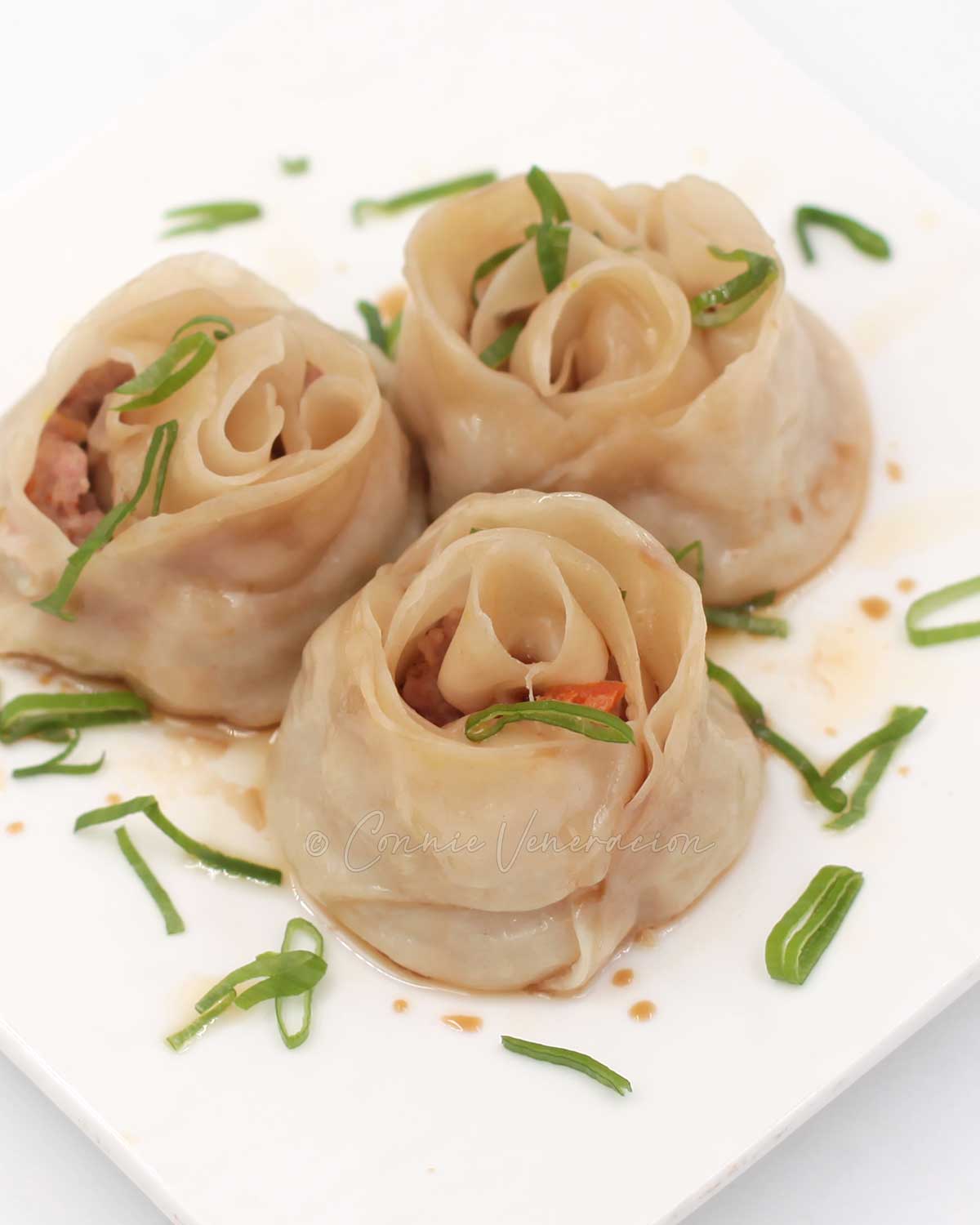 Rosebud dumplings on white plate
