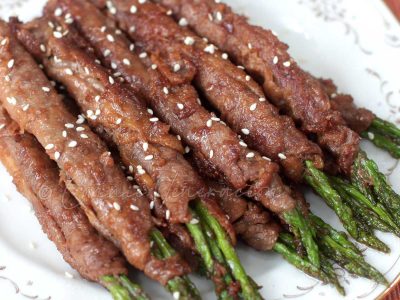 Beef and asparagus rolls with ginger teriyaki sauce