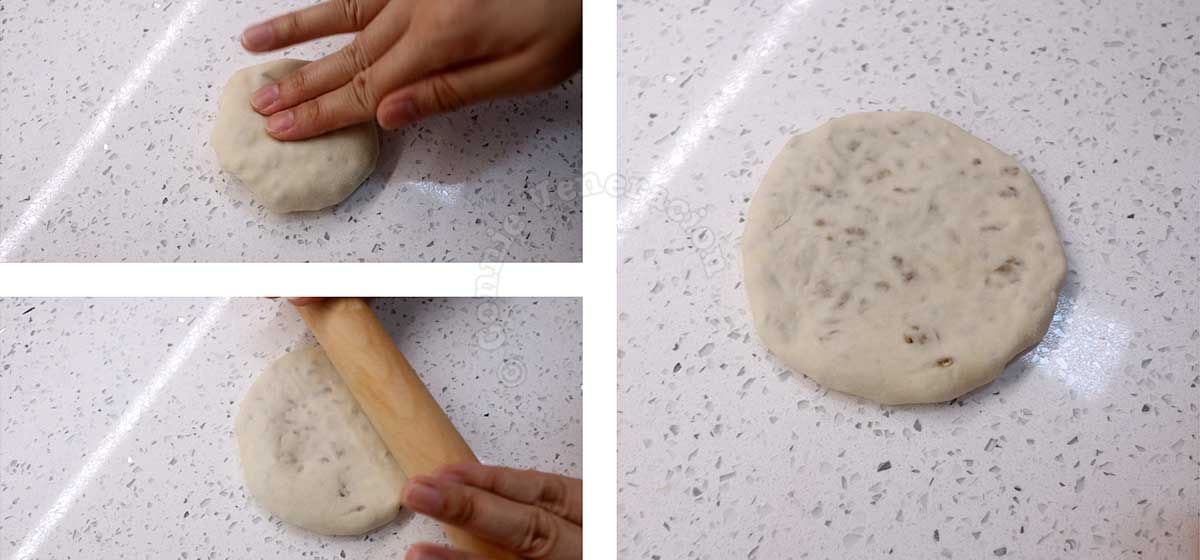 Flattening dough with beef curry filling