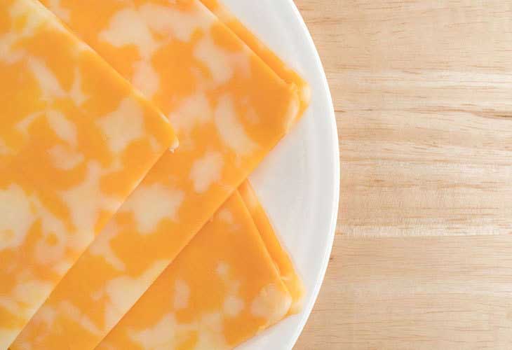 Cheese colored with annatto (achiote)