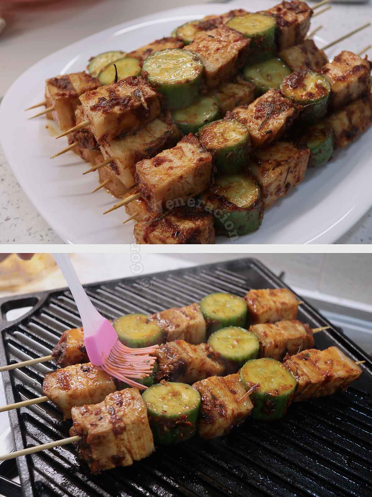 Skewered pork and zucchini on grill brushed with peri-peri sauce