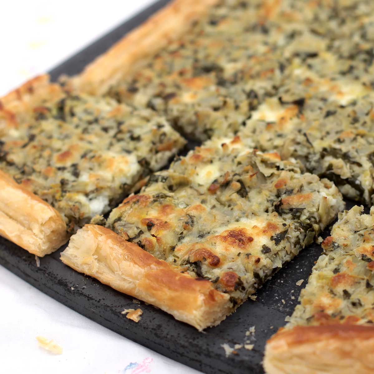 Spinach and artichoke puff pastry tart
