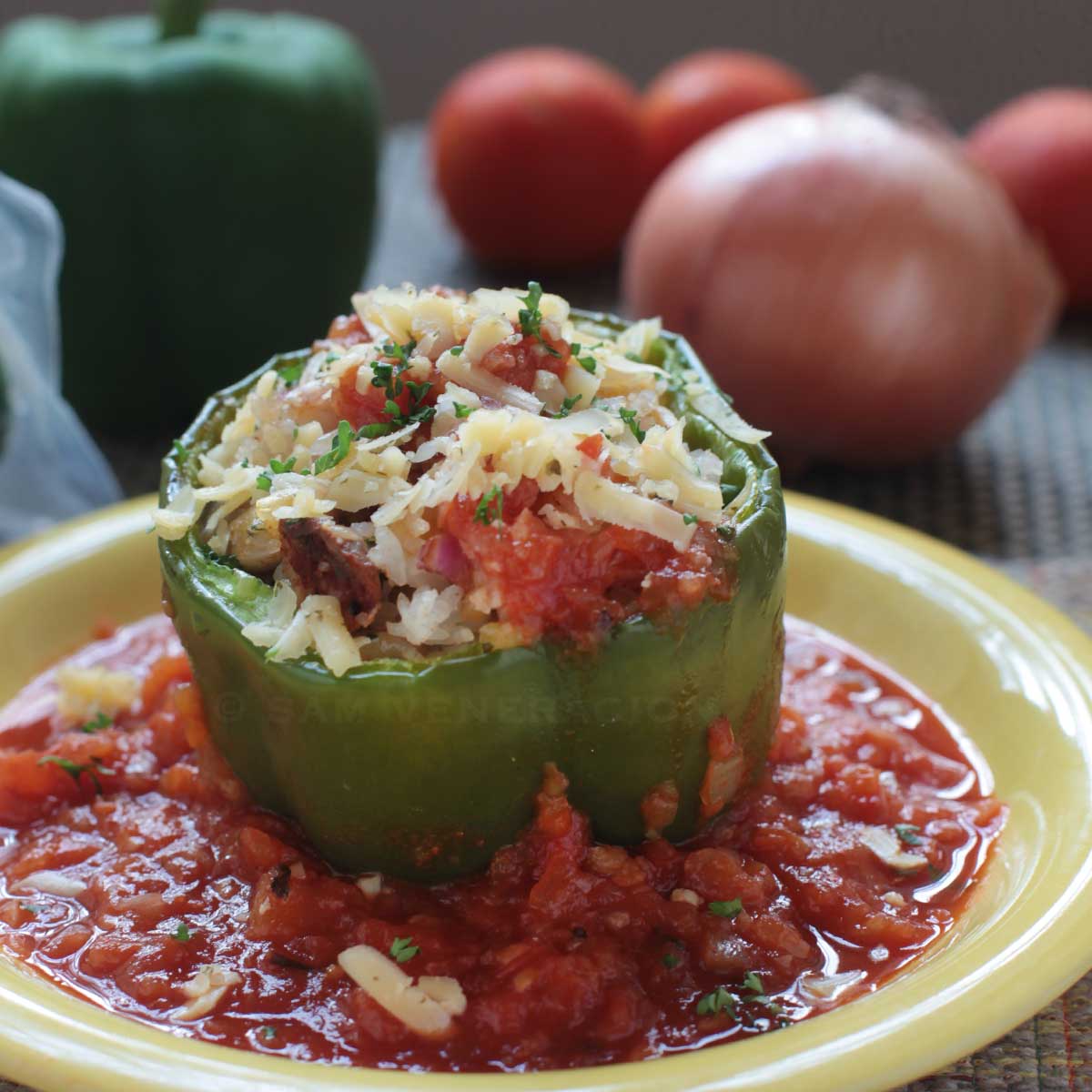 Baked bell pepper stuffed with rice, mushrooms and cheese