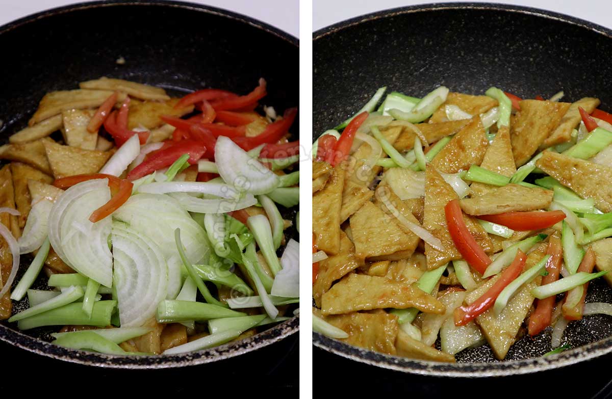 Tossing stir fried Korean fish cakes (odeng) with vegetables