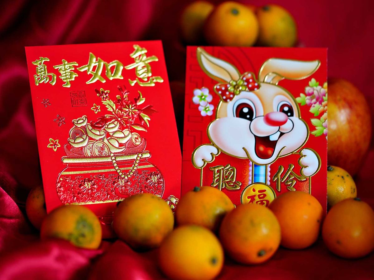 Lunar New Year staples: red envelopes and oranges