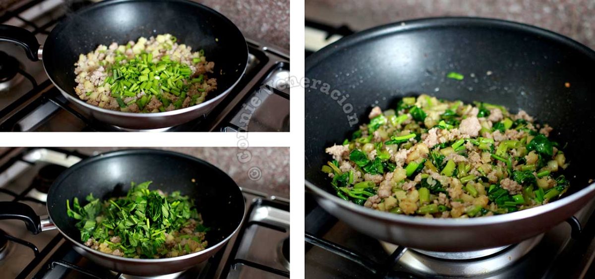 Adding spinach to stir fried ground pork, chilies and pineapple in wok