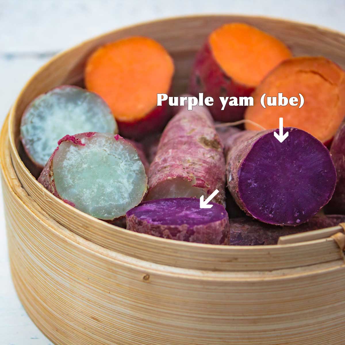 Purple yam (ube) and sweet potato in bamboo steamer