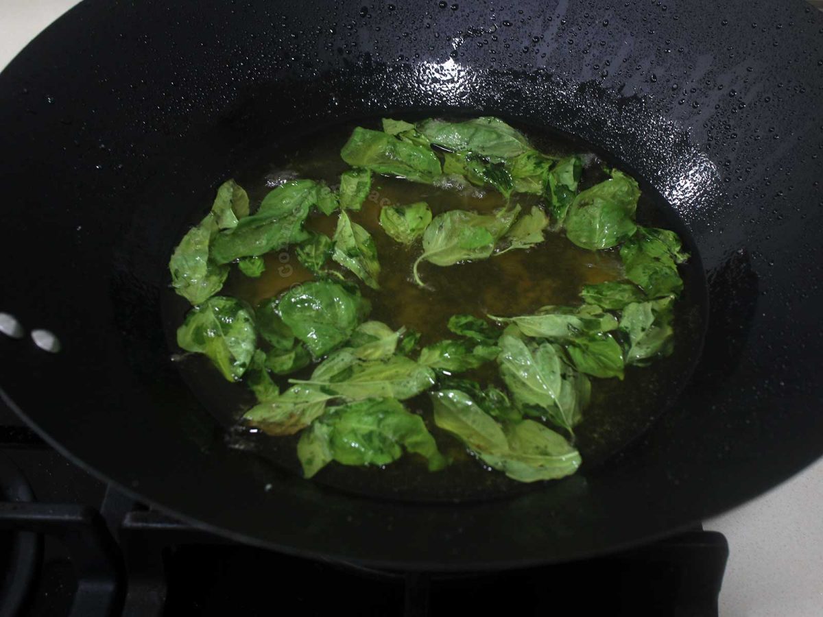 Frying Thai basil leaves