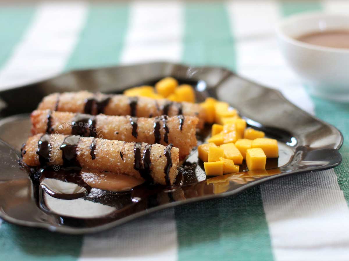 Fried suman (Filipino sticky rice cakes) with mangoes