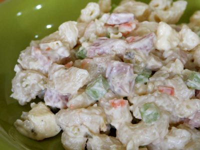 Macaroni salad with ham and cheese, carrot, celery, crushed pineapple, pickle relish and mayo