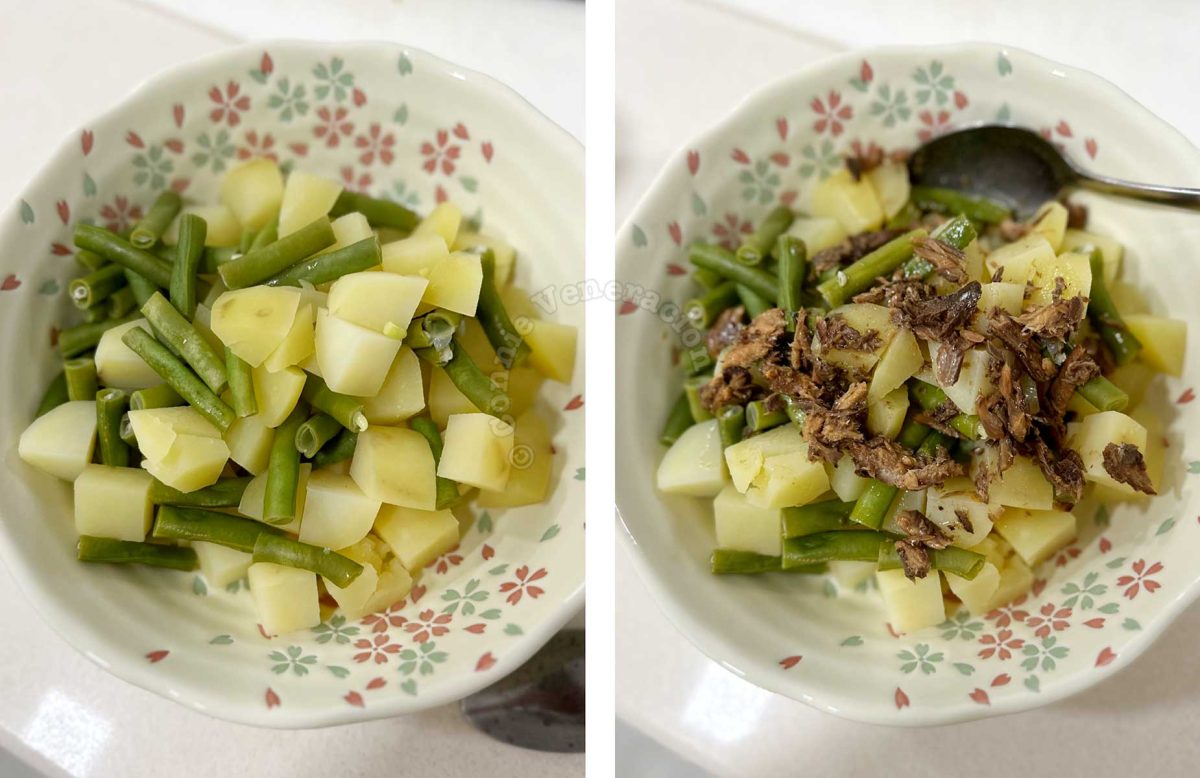 Tossing boiled potatoes and green beans with tinapa (smoked fish)