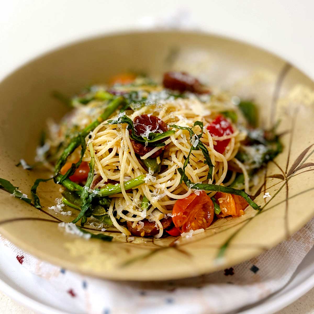 Spaghettini with chorizo, asparagus and cherry tomatoes