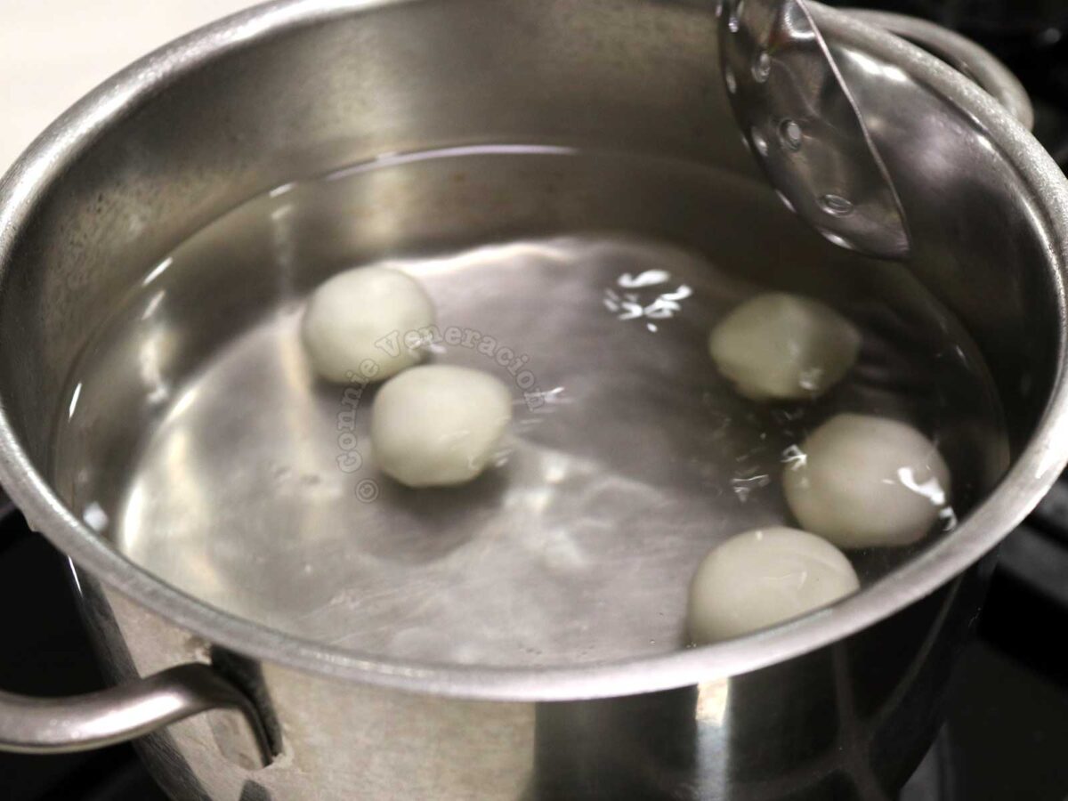 Boiling rice balls in water