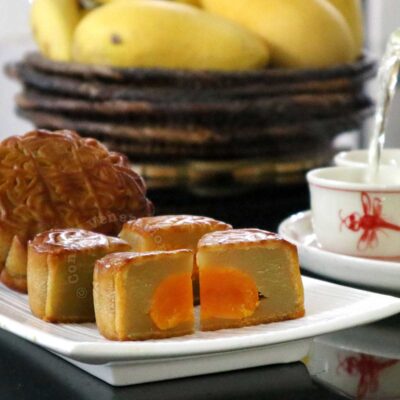 Chinese mooncakes with salted egg yolks, served with hot tea