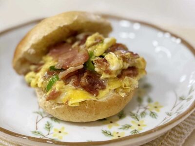 Scrambled eggs and bacon breakfast sandwich