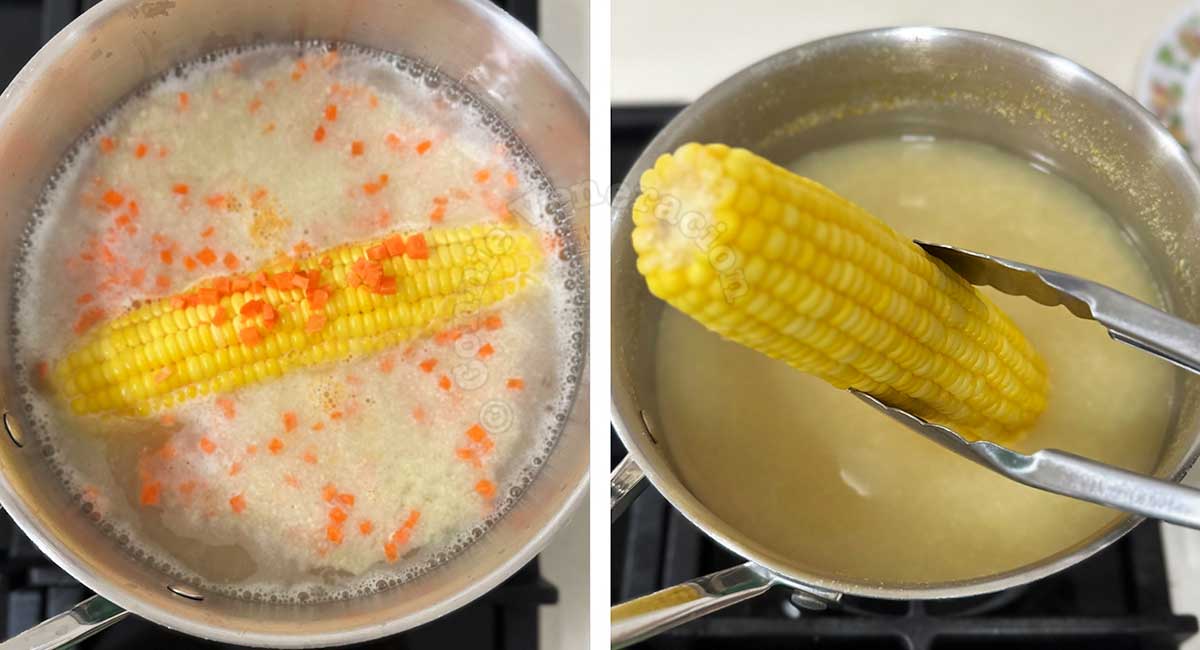 Boiling an ear of corn and chopped carrot in chicken broth