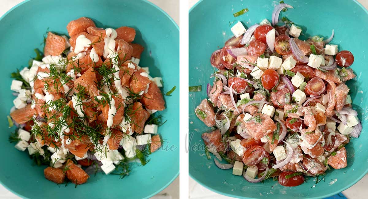 Tossing salmon, tomato and cheese salad with aioli and dill