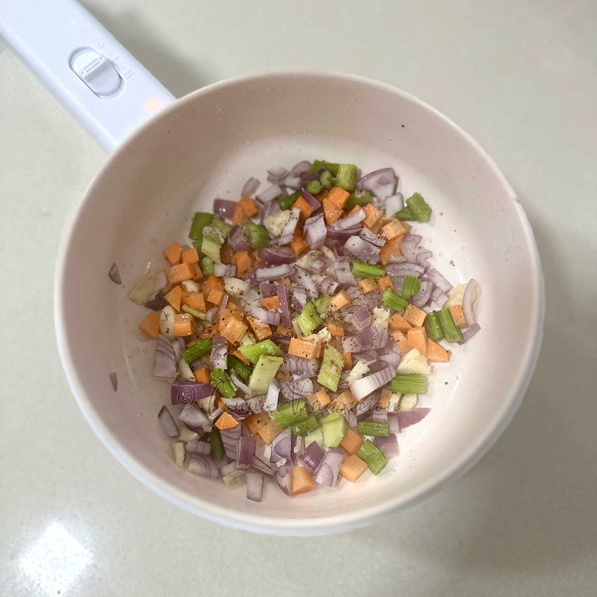 Sauteeing onion, celery and carrot in rice cooker