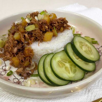 Pork adobo hash over rice
