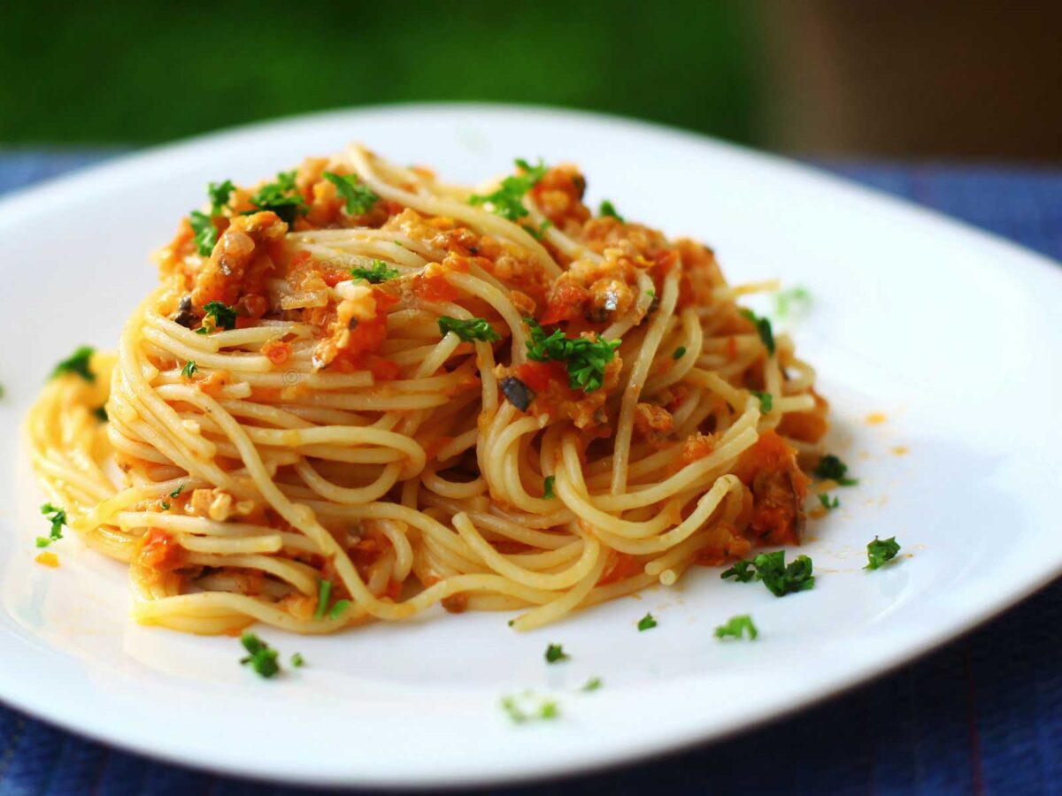 Spaghetti with sardines in brandied tomato sauce