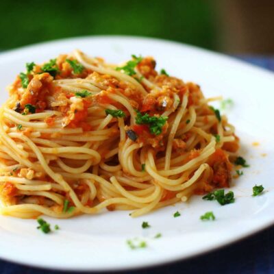 Spaghetti with sardines in brandied tomato sauce