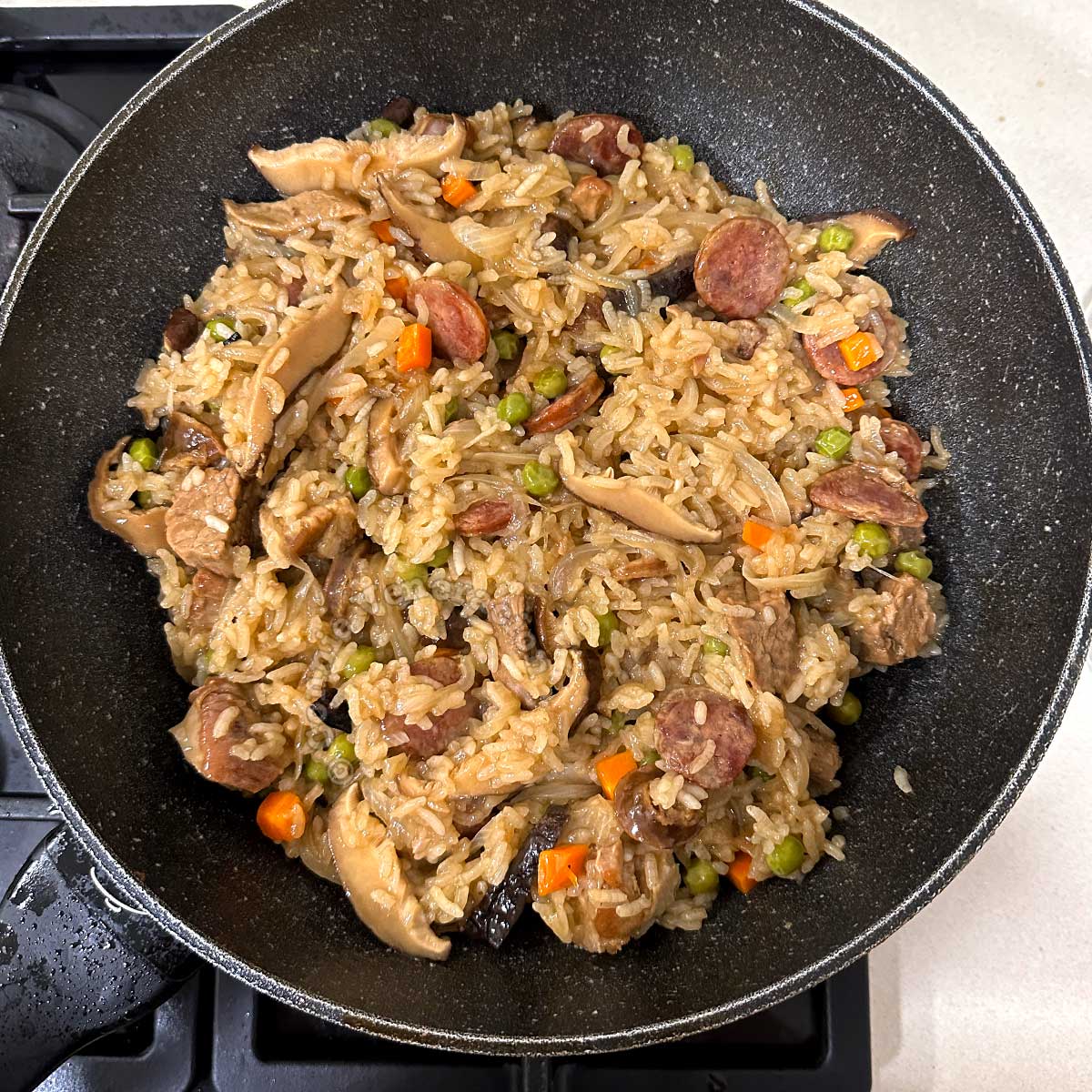Sticky rice with pork, sausage and mushrooms