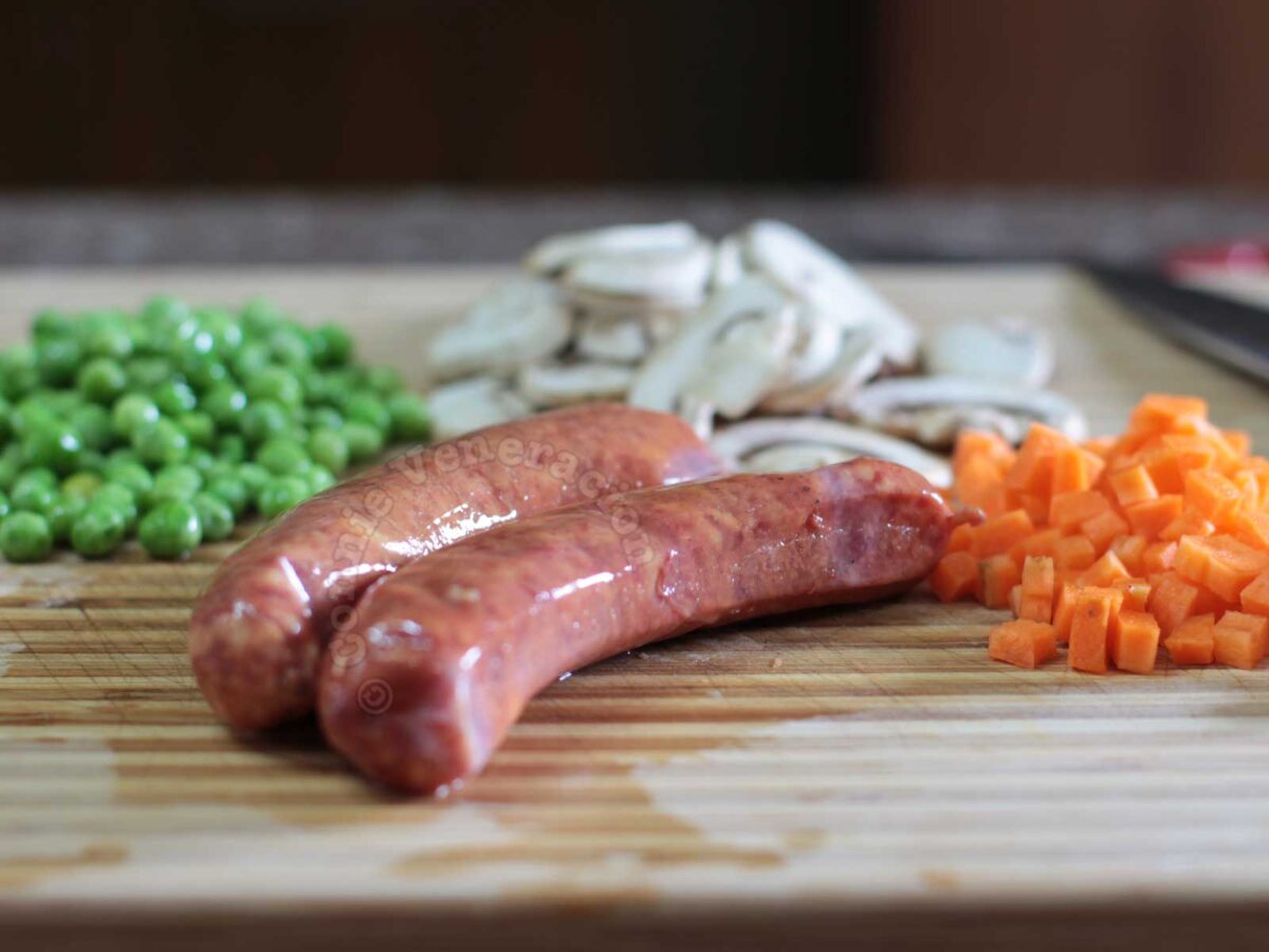 Sausages, peas, ccarrot and mushrooms