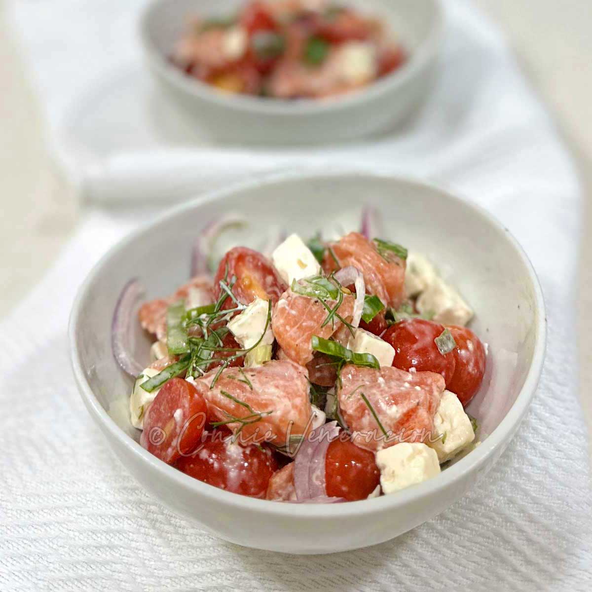 Salmon, tomato and cheese salad