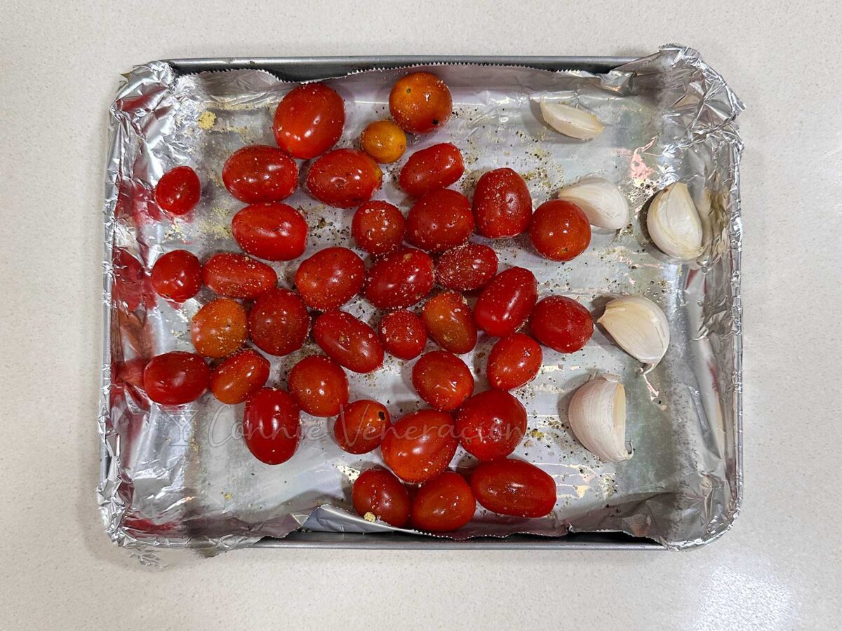 Cherry tomatoes and garlic cloves