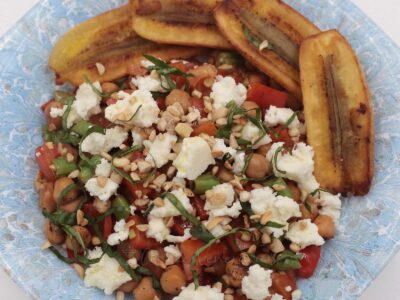 Sauteed chickpeas, green beans and tomatoes with crumbled feta