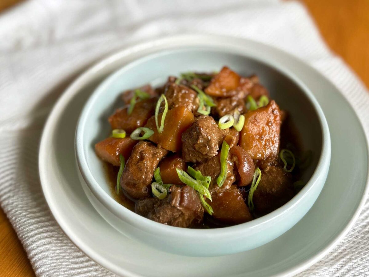 Pork adobo with fried sweet potatoes