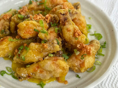 Fried chicken wings with lemon-orange glaze