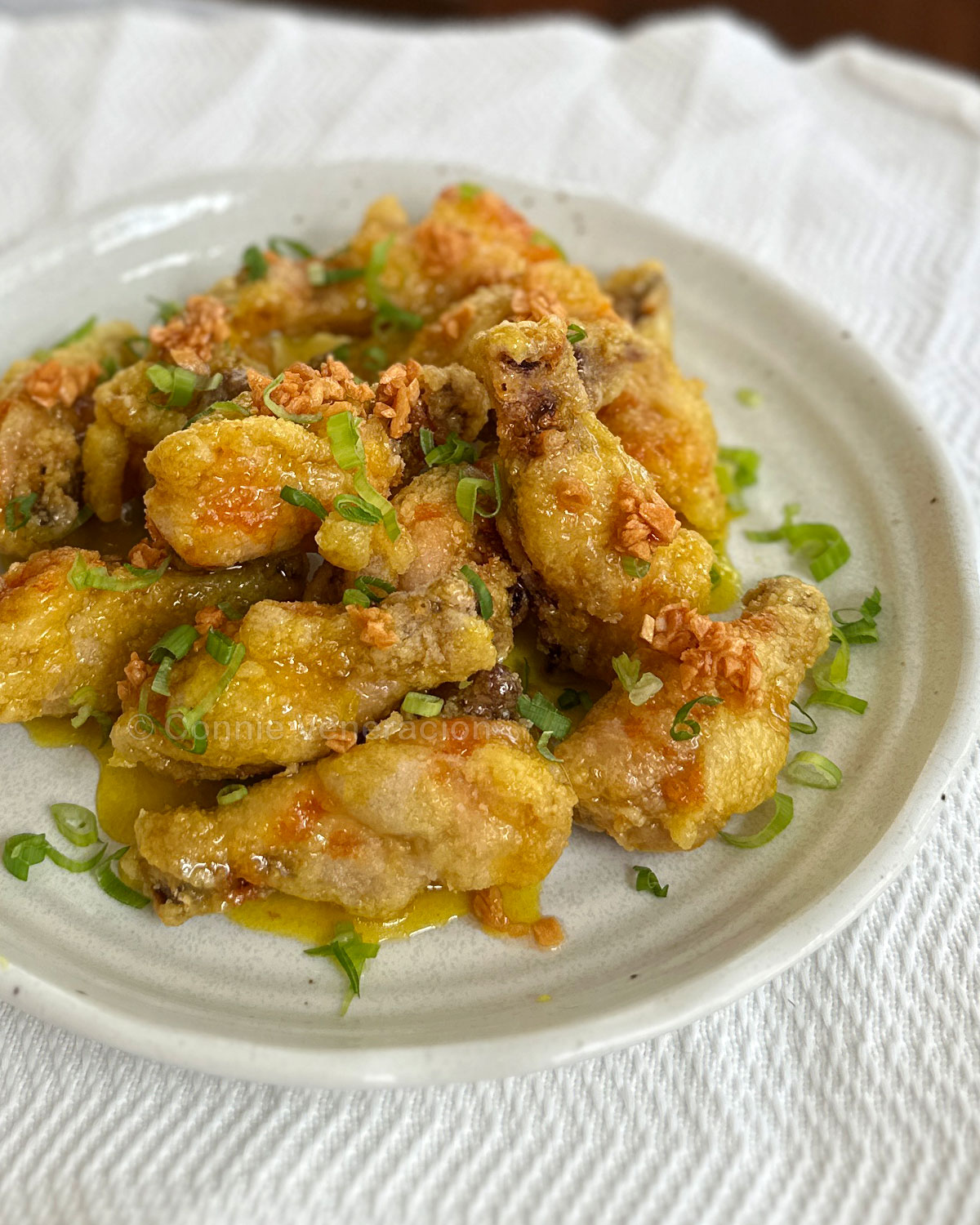 Fried chicken wings with lemon-orange glaze